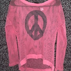 fishnet shirt with peace sign